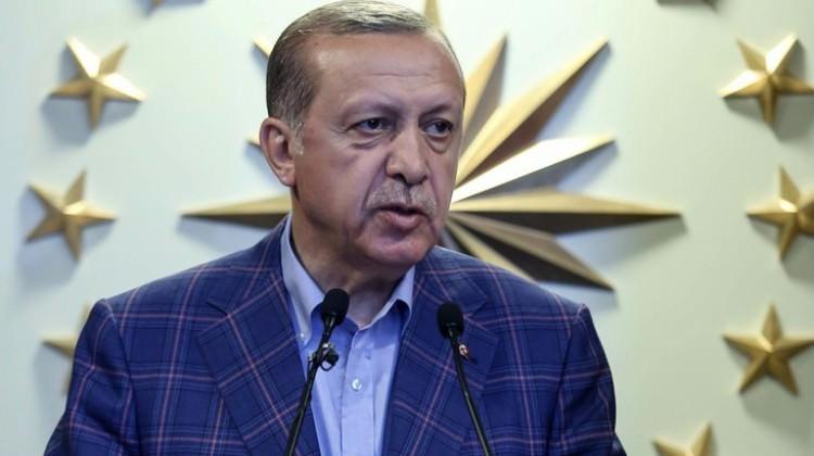 Erdoğan'dan milli güreşçiye tebrik mesajı