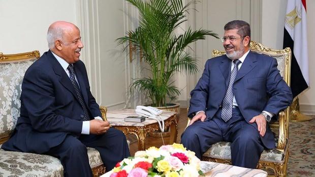 Eski Adalet Bakanı Ahmed Süleyman ile devrik Cumhurbaşkanı Muhammed Mursi...