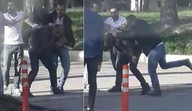 Kampüste genç kızın fotoğrafını çeken adama dayak!
