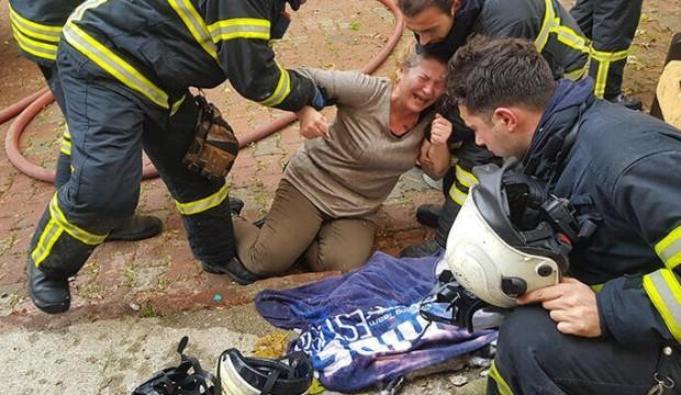 Yangında 3 kedisi ölen kadın sinir krizi geçirdi