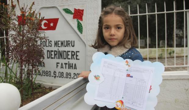 İlk karnesini şehit babasına götürdü