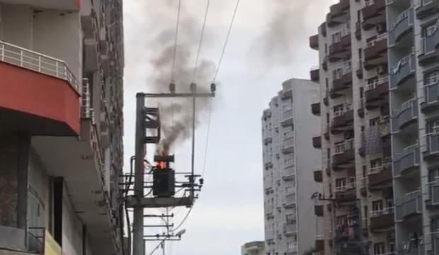 Yanan trafonun üzerine kovayla su döktü!